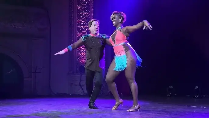 Latin dancers performing on stage in Ottawa